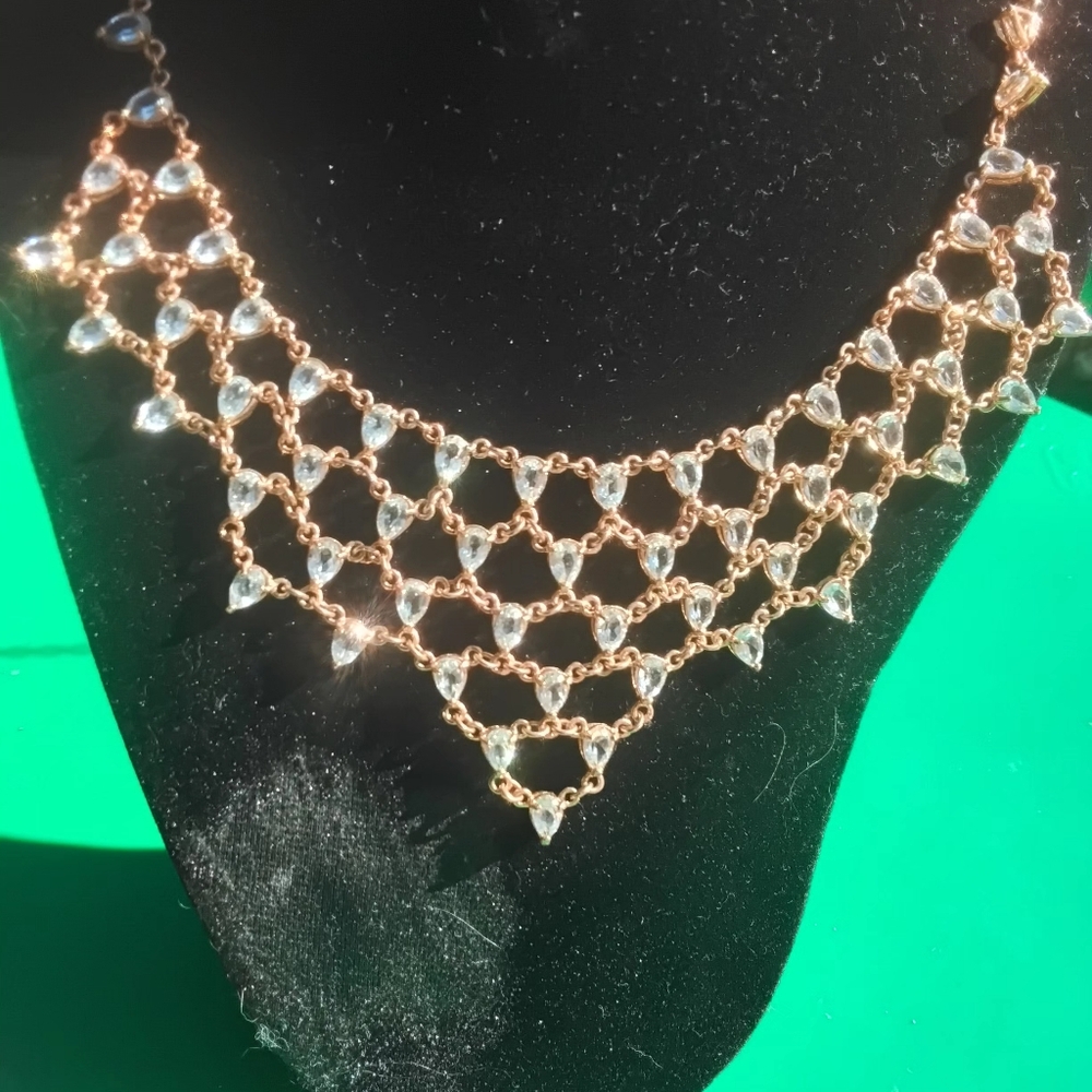 Luxurious Gold Lattice Bib Necklace With Light Blue Topaz 18 Kt Gp